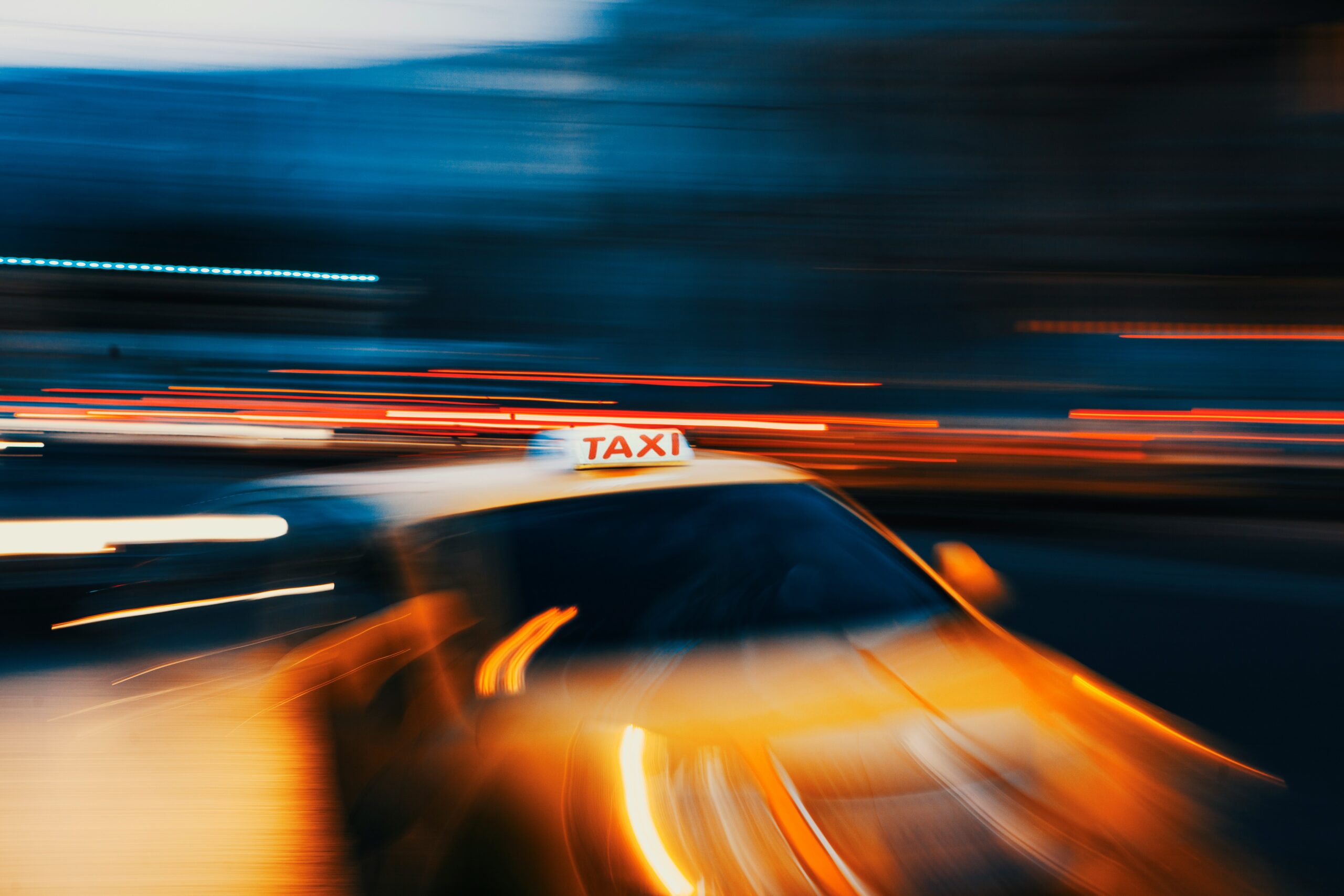 Lyft ride-hailing services car with taxi sign