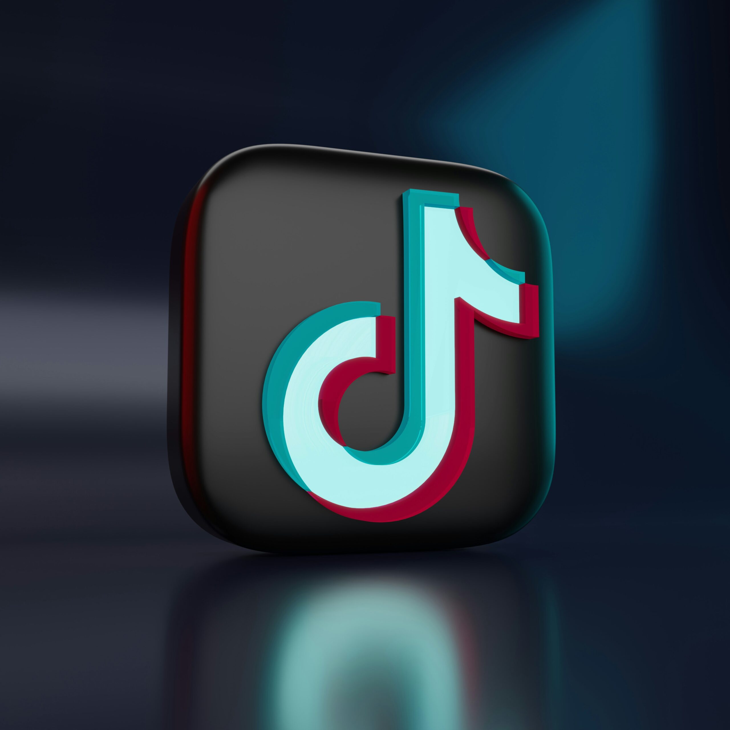 TikTok app logo with U.S. flag in background symbolizing the legal battle over the TikTok ban in the U.S.