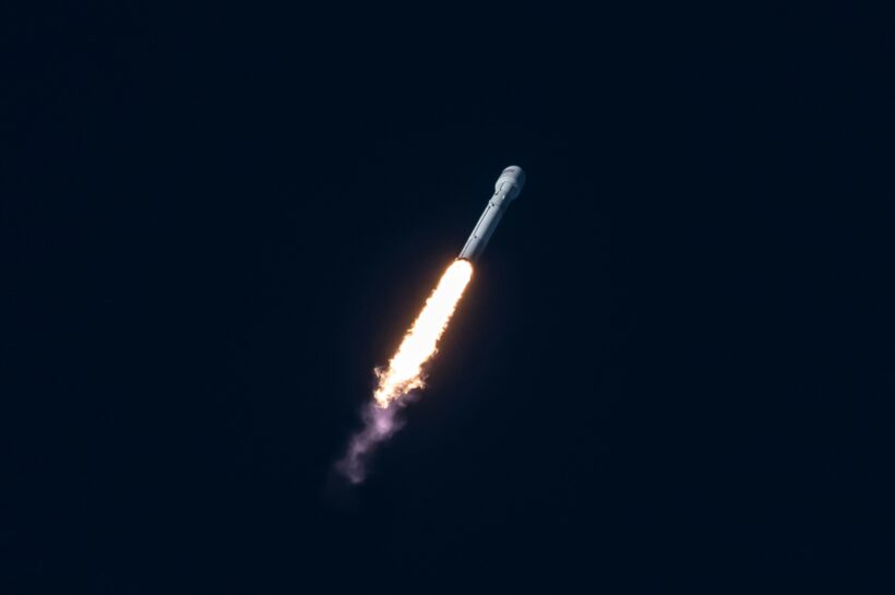 A visual showing Amazon’s Project Kuiper satellites in orbit around Earth.